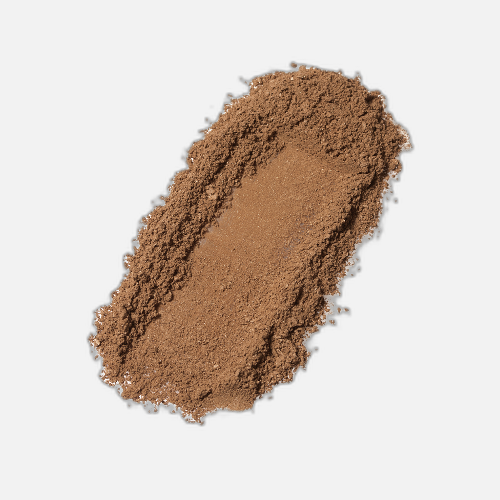 Pó Compacto Pupinha · swatch cor bronze caramelo